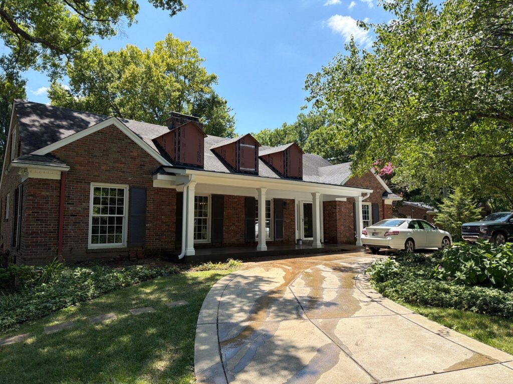 front porch with dormers above