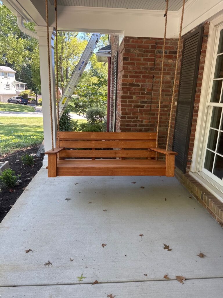 hanging swing bench on a front porch