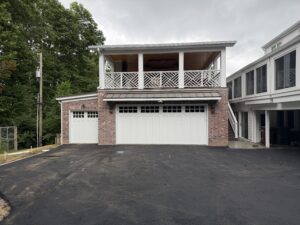 3 car garage with upstairs covered patio