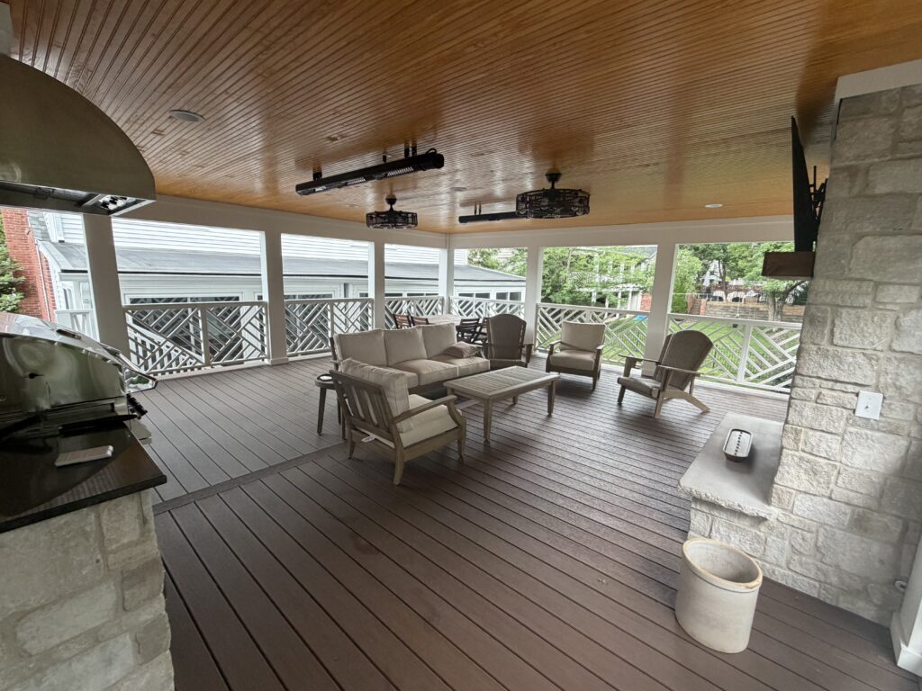 outdoor covered patio above garage