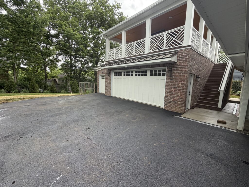 two story garage with covered patio above