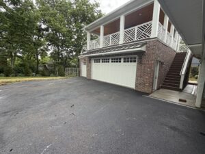 two story garage with covered patio above