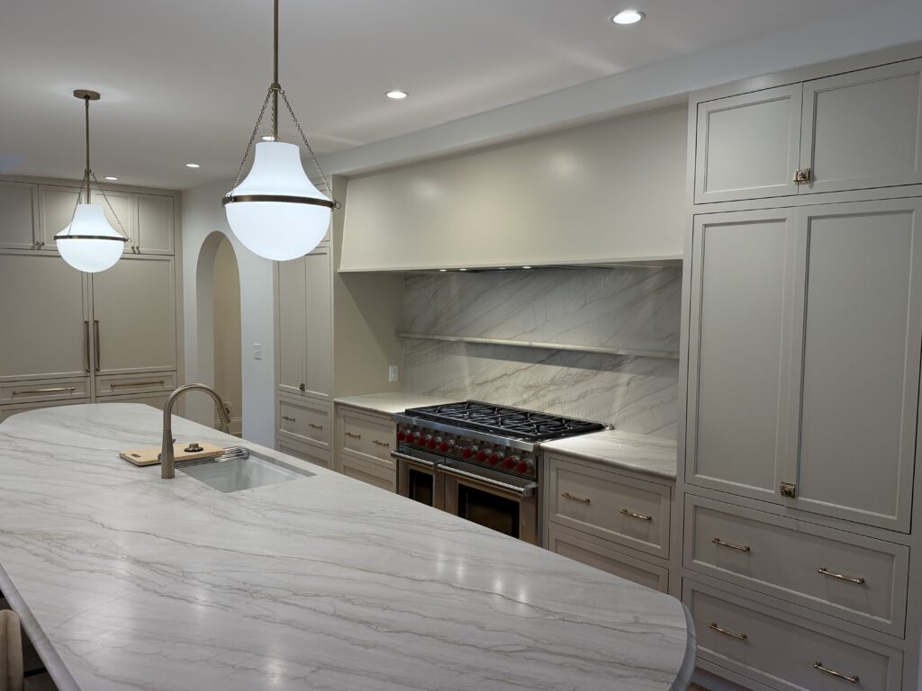 Walnut Lane whole-home remodel in Anchorage KY — luxury kitchen with marble countertops and custom Amish-built cabinetry
