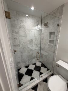 Walk in shower marble tile