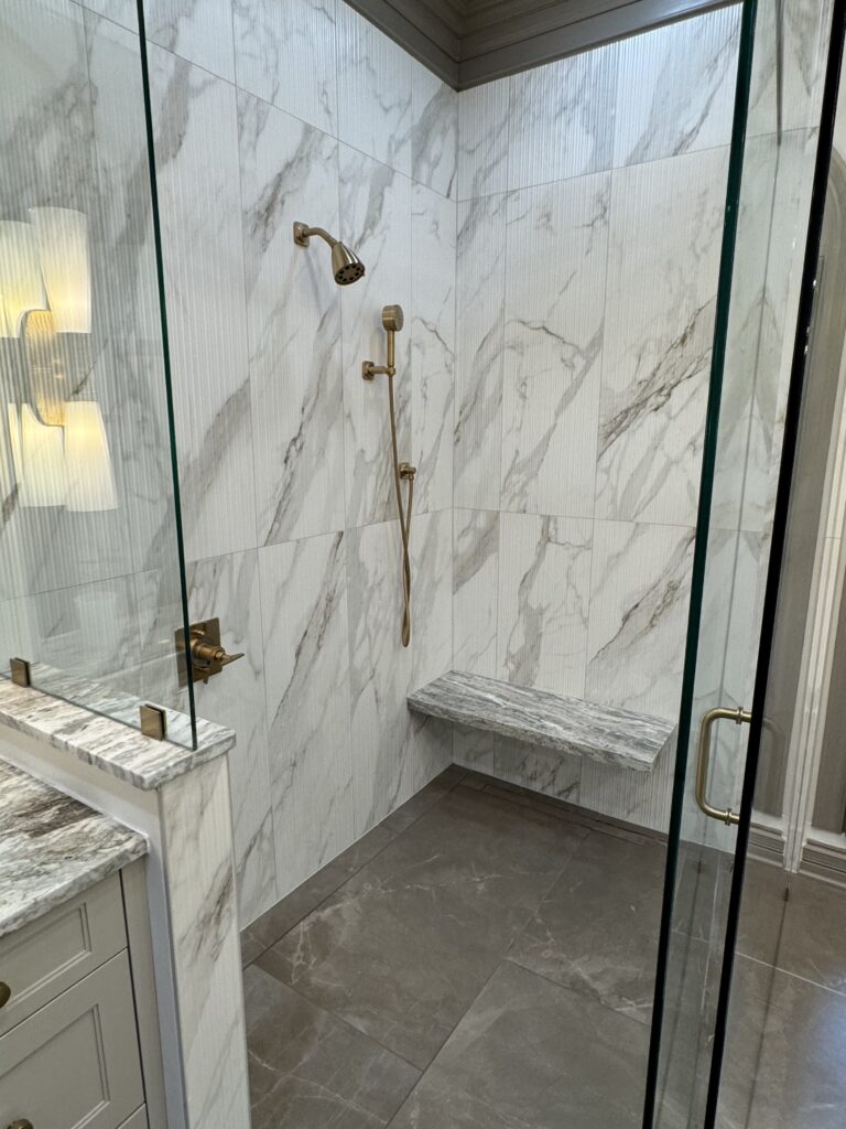 master shower with floating bench curbless